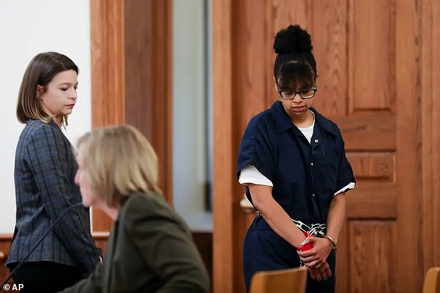 The mother of the children, Elizabeth Archibeque (seen here at her own sentencing), last year was slammed as 'heinous, cruel and depraved' by Coconino Superior Court Judge Ted Reed, who at the time said she deserved imprisonment for 'the rest of [her] natural life'