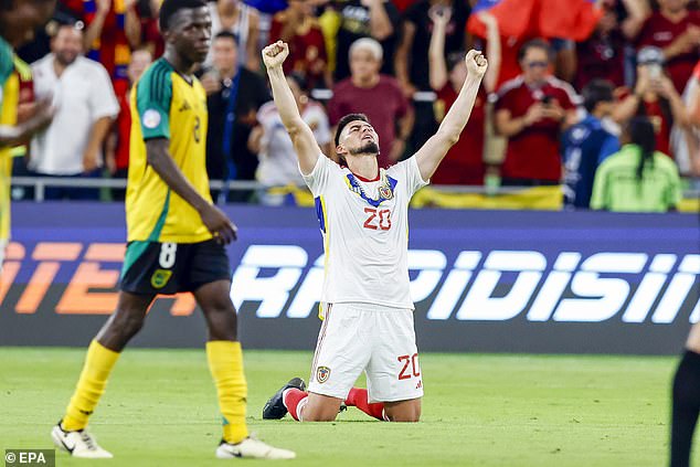 Venezuela celebrate after thrashing Jamaica 3-0 to top the group and reach the quarter-finals