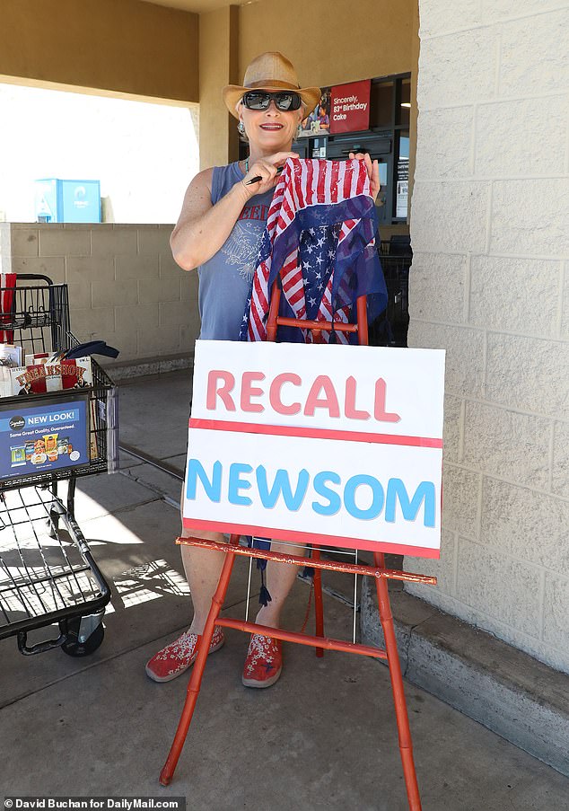 California Republican Jackie, 67, who declined to give her last name, was soliciting signatures for a new petition to oust the Governor Newsom in the red city of Susanville, in Lassen County