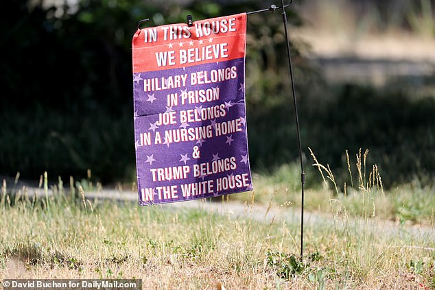 A pro-Trump flag mocking Democrats Joe Biden and Hillary Clinton is decorates a lawn in Susanville