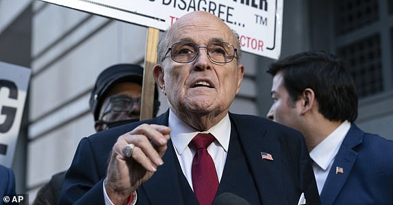 FILE - Former Mayor of New York Rudy Giuliani speaks during a news conference outside the federal courthouse in Washington, Dec. 15, 2023. Guiliani, a lawyer for former President Donald Trump, was among those indicted Wednesday, April 24, 2024, in an Arizona election interference case.(AP Photo/Jose Luis Magana, File)