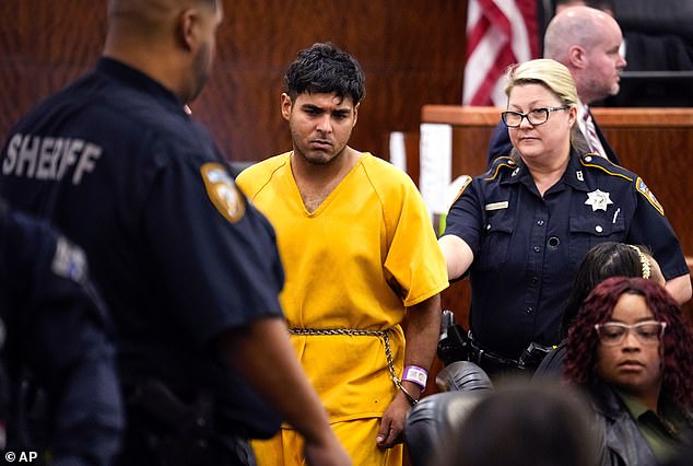 Johan Jose Rangel-Martinez, 21, one of the two men accused of killing 12-year-old Jocelyn Nungaray, is led from the courtroom by deputies on Tuesday