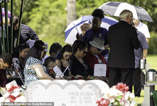 Jocelyn Nungaray's mother, pictured center in sunglasses looking down next to a little boy, did not speak at her daughter's service