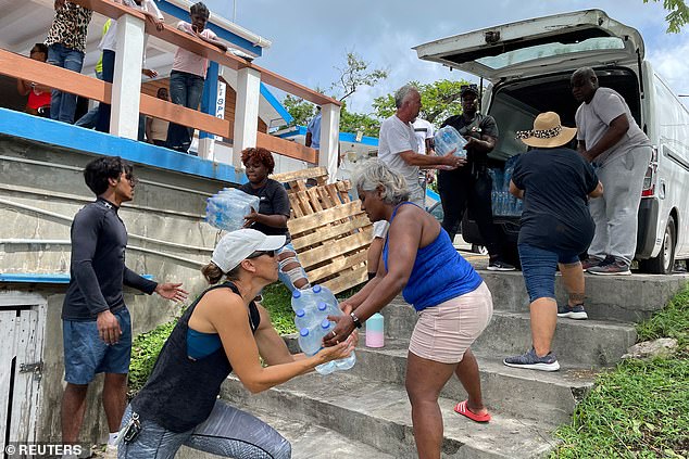 Essential supplies are being loaded onto a vessel at Grenada Yacht Club, destined for the island of Carriacou which was hit hard by Hurricane Beryl, in St. George's, Grenada July 2, 2024