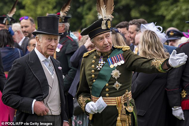 The royal appeared to be in high spirits as he enjoyed the garden party in the Palace of Holyroodhouse