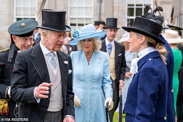 Pictured: King Charles III meets Victoria Webber, one of the first female High Constables, at the party