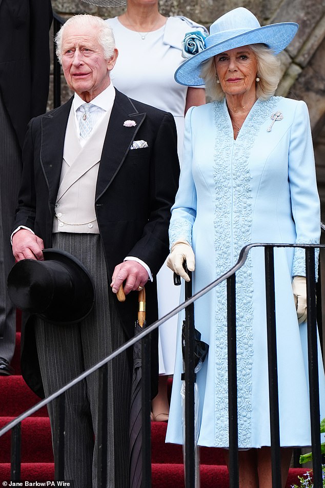 Charles and Camilla pictured during the Sovereign's Garden Party held at the Palace of Holyroodhouse in Edinburgh