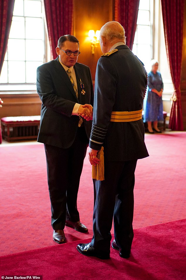 Music advisor, Honours of Scotland Service, Professor Paul Mealor, from Aberdeen, is made a Lieutenant of the Royal Victorian Order by King Charles III