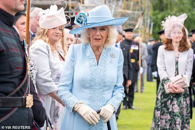 Camilla donned a sophisticated powder blue suit for the garden party. The Queen was the image of elegance