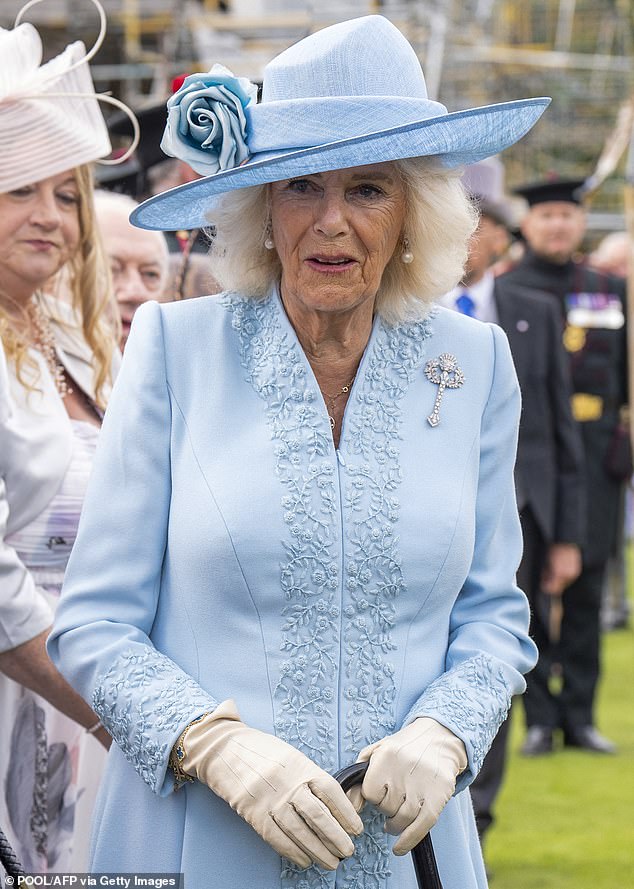 76-year-old Queen Camilla opted for summery blue attire for the occasion, complete with a matching hat