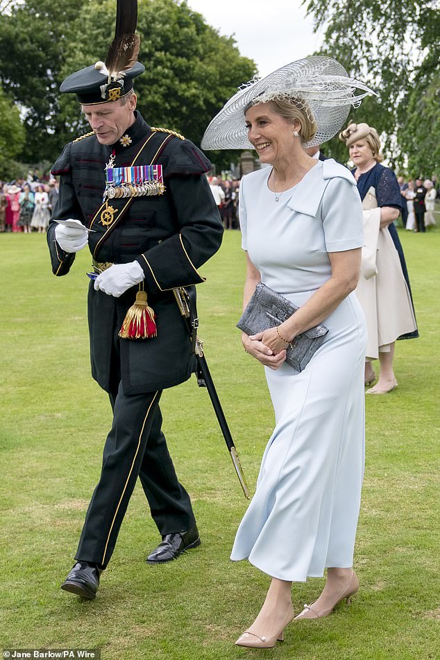 Sophie cut an elegant figure in a ice blue dress from Roland Mouret and a summery Jane Taylor hat