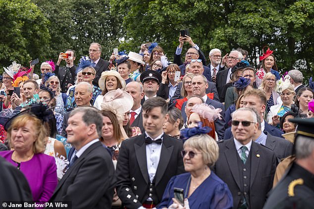 8,000 guests gathered at the Sovereign's Garden Party held at the Palace of Holyroodhouse in Edinburgh today