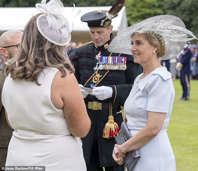 The 59-year-old was all smiles as she chatted with guests at the Sovereign's Garden Party in Edinburgh