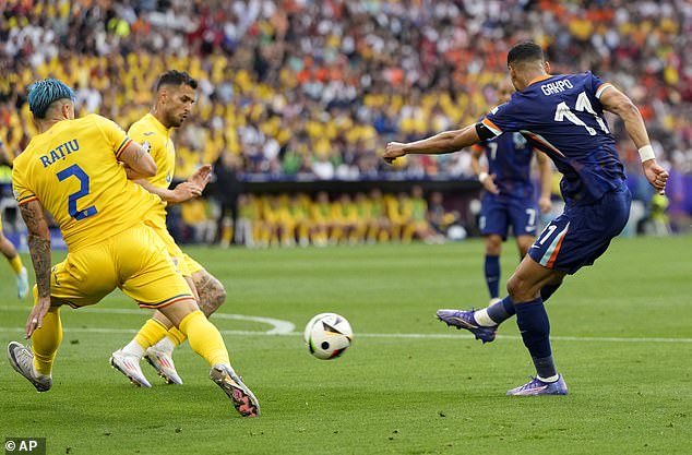 Gakpo (right) scored and produced an assist to help his side advance to the quarter-finals