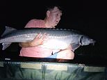 Stunned angler catches massive 48lbs fish thought to have been extinct in British rivers for 31 years