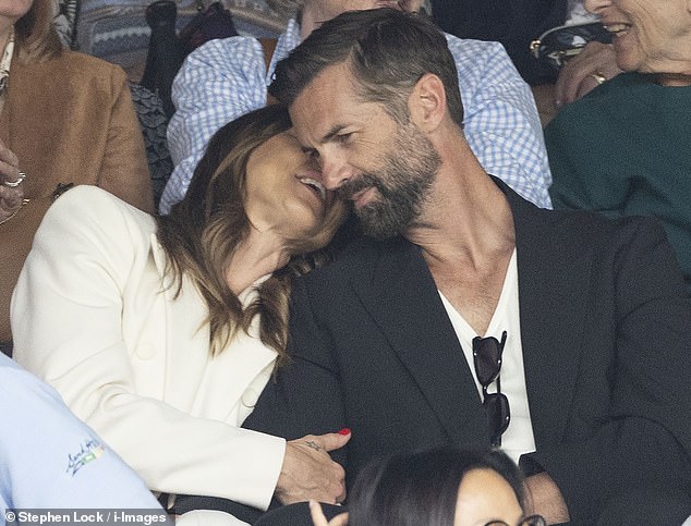 The former Spice Girl couldn't keep their hands off each other as they enjoyed a day out at the tennis in south west London - after going public with him at Glastonbury last weekend