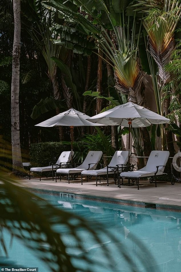 The cooling, palm leaf shaded pool at the Brazilian Court offers the perfect escape from prying eyes