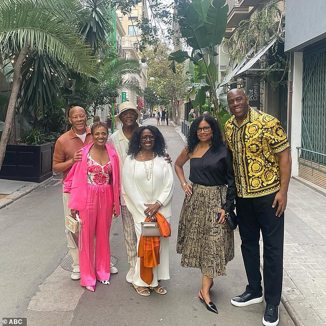 The original photo showed only three couples walking along the streets of Barcelona, Spain