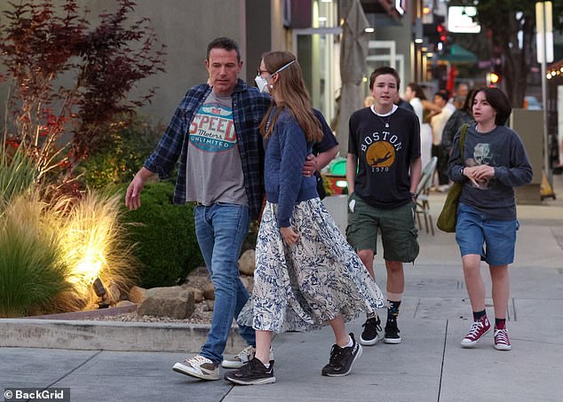 The actor, 51, brought Violet, 18, Fin, 15, and their friends to Kaz The Soba Place for an evening meal - with his ring still on his finger