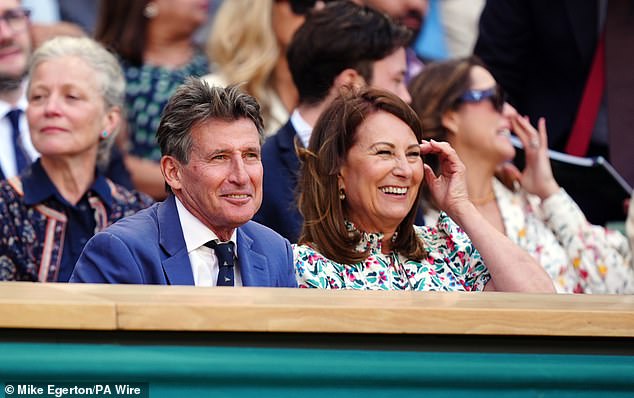 Dressed in all their finery, the beaming couple looked in good spirits as they arrived side-by-side for the prestigious event in London. Carole pictured chatting with Sir Sebastian Coe