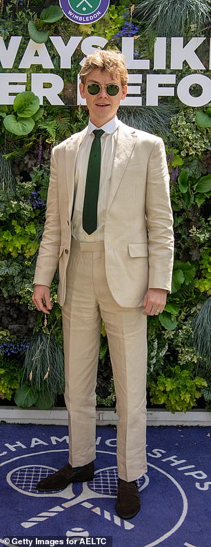 Meanwhile Love Actually star Thomas donned a smart neutral suit