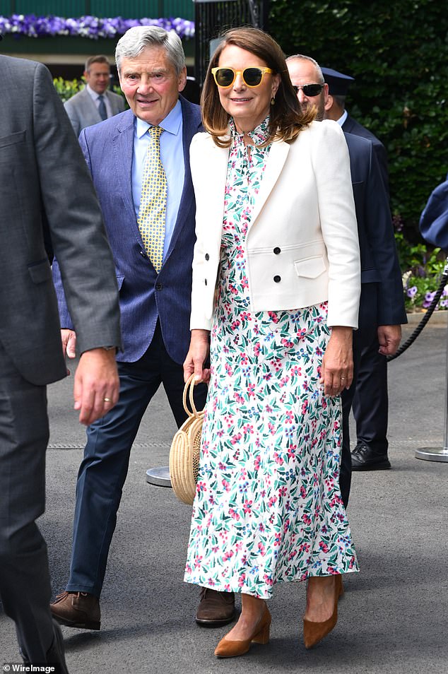 Carole Middleton made her arrival wearing a pretty floral dress which was complimented perfectly with a white blazer