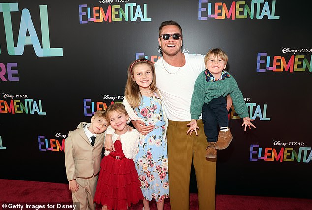 'The kids really love Minka and really love their mom, and that's okay. We view it as kind of bonuses to the family: more people to love, more people to help,' he added; seen in 2023 in L.A.