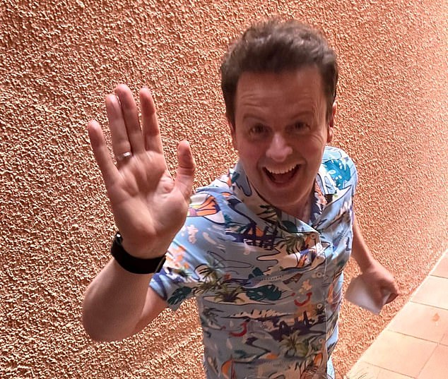 But Ant and Dec made a point of waving at the families who had gathered around the pool to greet them and handed out high-fives to children who had come over to see them