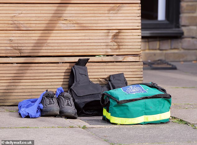 A medical kit on the floor at the scene of a stabbing in Feltham