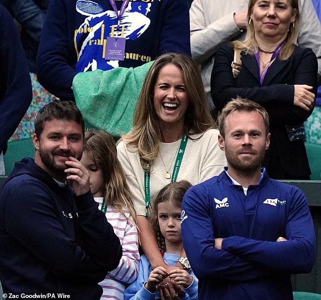 She watched on smilingly as Andy was surprised by Sue Barker - who led an emotional goodbye to the Scots tennis star moments after his defeat