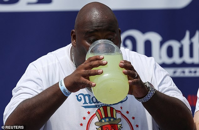 Eric Booker, 55, chugged an entire jug of lemonade in just 21 seconds on Independence Day