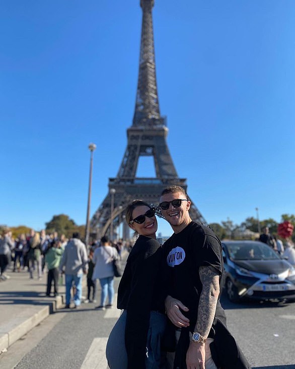 Trippier and wife Charlotte pose for a picture close to the Eiffel Tower in Paris