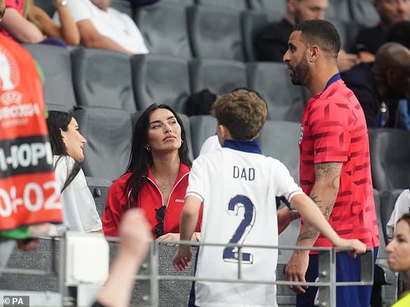 Walker with his wife Annie Kilner and their family after England's game against Denmark