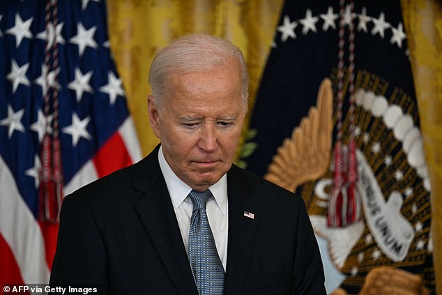 The president tiredly gazes down during a Medal of Honor ceremony at the White House on Wednesday