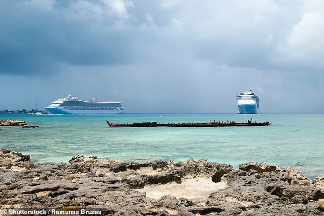 Two cruise ships near George Town on Grand Cayman island. Cruise ship passengers here outnumber residents 11 to one