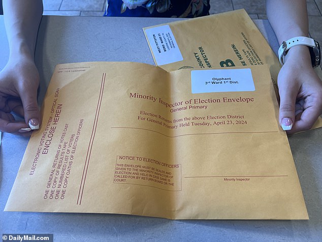 Carr showed Daily Mail envelopes of votes sealed and held by election officials like her until they may be needed for recounts or verifying ballots