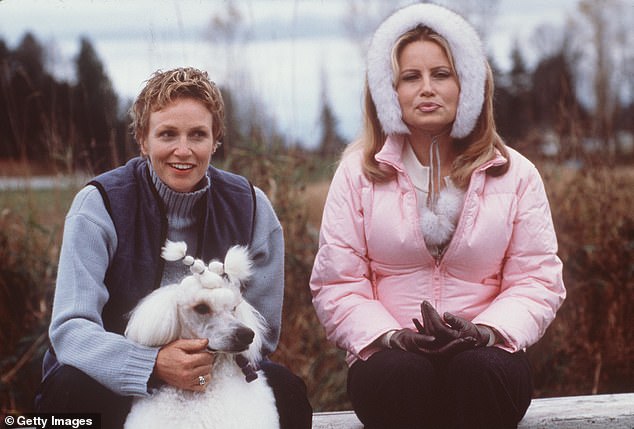 The star channeled her 2000 film, Best In Show, where she took on the role of taskmaster trainer, Christy Cummings; seen with Jennifer Coolidge in the movie