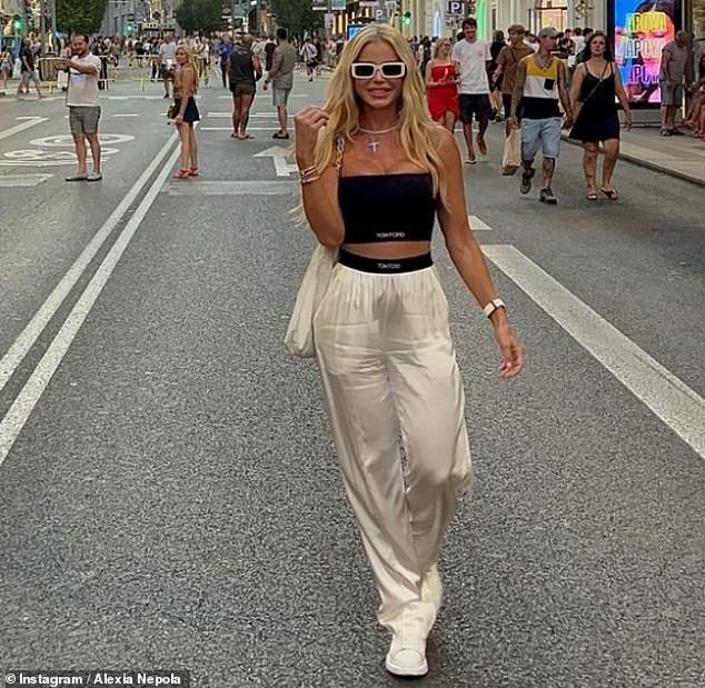 The Miami native - who wore beige pants, a black crop top and white sneakers - captioned her Friday Instagram post: 'First stop of my Eurotour'