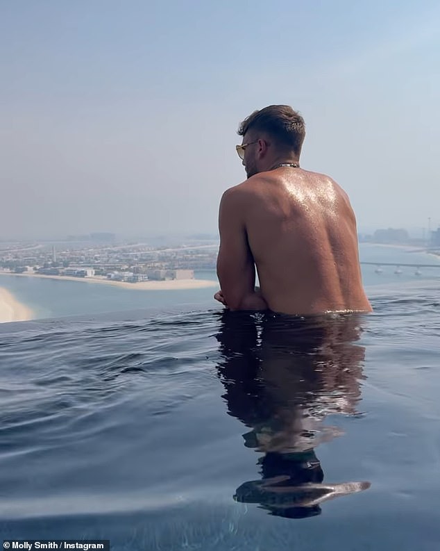 The model captured Tom as he took a dip in the infinity pool