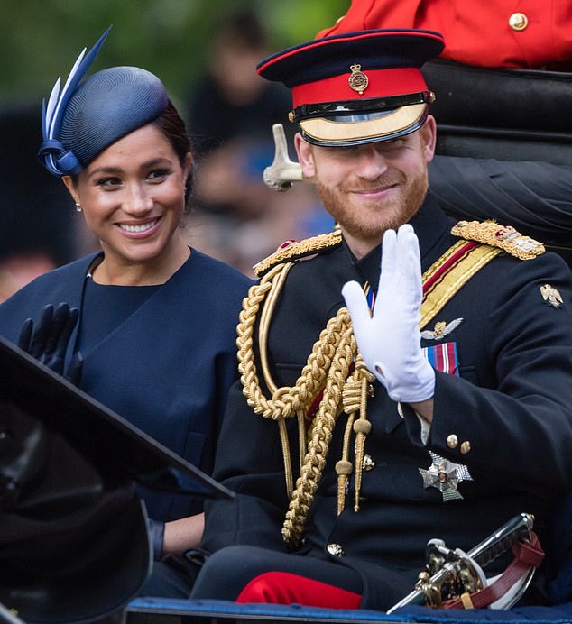 Prince Harry (pictured with Meghan) was 'stunned' by the backlash he faced after being nominated for an award named after an American war hero killed in Afghanistan, sources have claimed