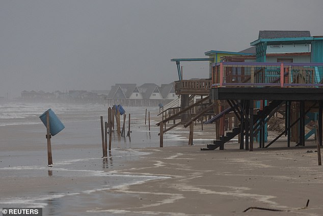 Rain and swells from Hurricane Beryl along Surfside Beach, Texas on Sunday, July 7, 2024