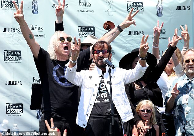 Ringo added striped tracksuit bottoms and several peace sign pins, while sporting his usual tinted sunglasses