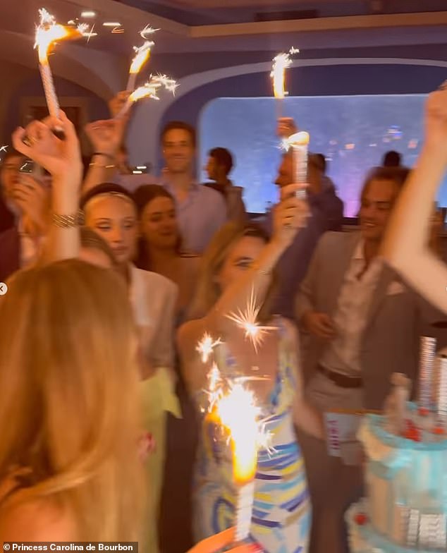 Guests carried sparklers to sing happy birthday and celebrate Carolina's birthday