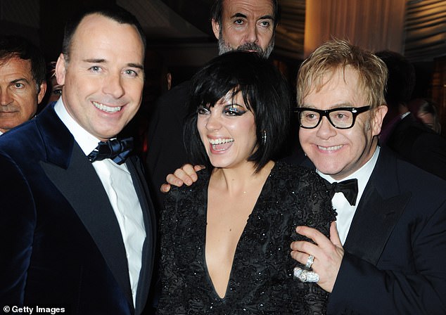 Speaking on her Miss Me? podcast, Lily recalled that she had been sent to Elton's house in an attempt to curb her excessive drinking, when the female A-lister had asked for a favour to help raise money for charity (pictured with Elton and David Furnish in 2009)