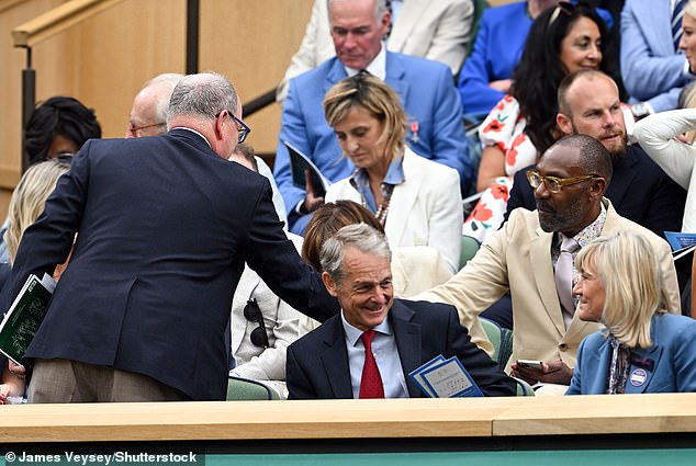 Prince Albert was seen greeting Lenny Henry, with the pair shaking hands as they took to their seats