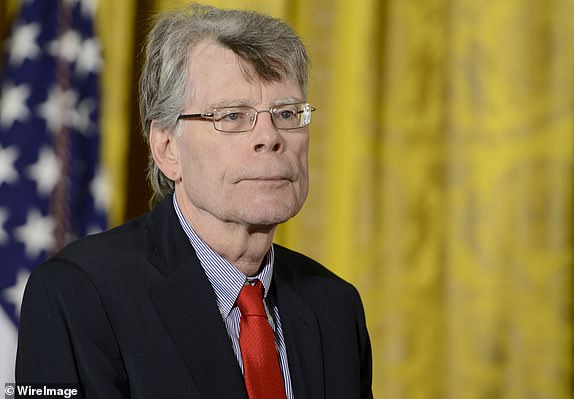 WASHINGTON, DC - SEPTEMBER 10:  President Barack Obama presents author Stephen King with the 2014 National Medal of Arts at The White House on September 10, 2015 in Washington, DC.  (Photo by Leigh Vogel/WireImage)