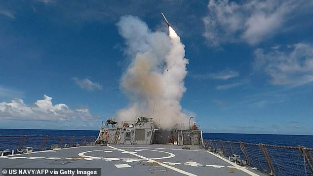 This file handout image obtained from the US Navy and taken on September 20, 2016 shows a Tomahawk Missile being launched from the Arleigh Burke-class guided-missile destroyer USS Stethem