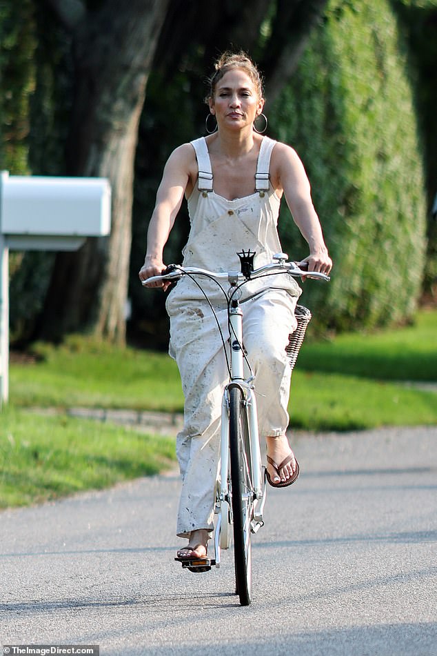 Jennifer Lopez looked somber on Tuesday as she took a bike ride on the day of her second wedding anniversary ¿ with her husband Ben Affleck nowhere to be seen