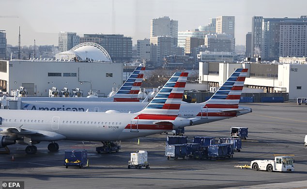 American Airlines flights parked at gates after flights were delayed nationwide