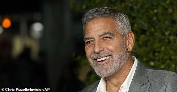 FILE - George Clooney, a cast member in "Ticket to Paradise," poses at the premiere of the film, Monday, Oct. 17, 2022, at the Regency Village Theatre in Los Angeles. Just weeks after headlining a record-breaking fundraiser for the president's reelection campaign, Clooney wrote a New York Times opinion piece calling for Biden to end his bid. (AP Photo/Chris Pizzello, File)